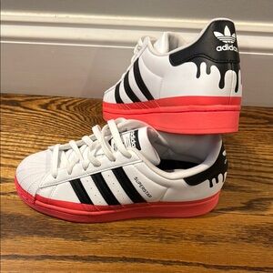 Adidas White and Black Sneakers with Red Soles
